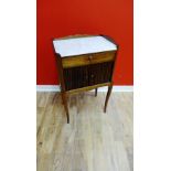 A small 19th century mahogany bedside cabinet with a three quarter gallery, insert marble top, drawn