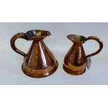 Two copper harvest jugs, pair of brass candlesticks, copper pot and a green table ware and