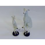 Four Staffordshire greyhound figures (4)