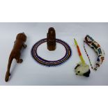 A box to contain carved African figures, pipes and other tribal items (a lot)