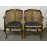 A pair of 1930s Bergère armchairs with upholstered seats - A/F