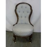 Victorian mahogany upholstered nursing chair on four cabriole legs