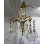 Gilt metal and glass five light chandelier