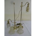 A pair of white metal table lamps and two glass shades