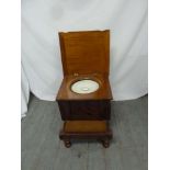 A Victorian mahogany commode on four turned bun feet - A/F