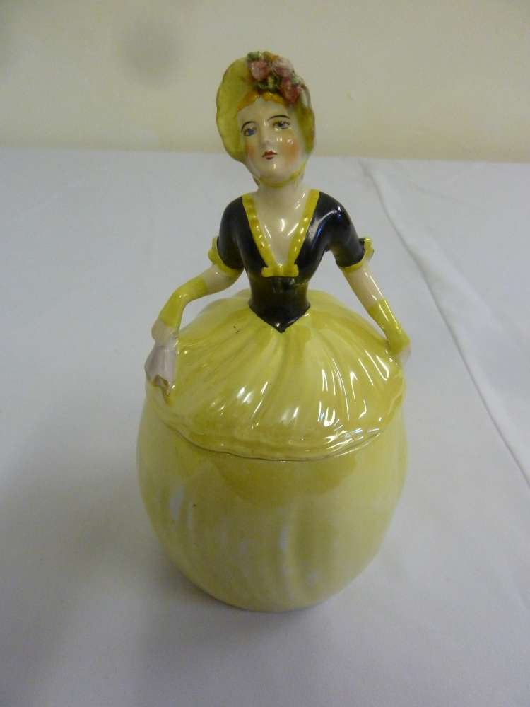 Carltonware biscuit barrel in the form of a lady with pull-off cover