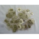 A quantity of silver coins to include pre 1947 silver