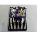 A quantity of silver flatware and a cased set of silver handled dessert eaters