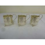 Three silver tea glass holders, Birmingham 1935