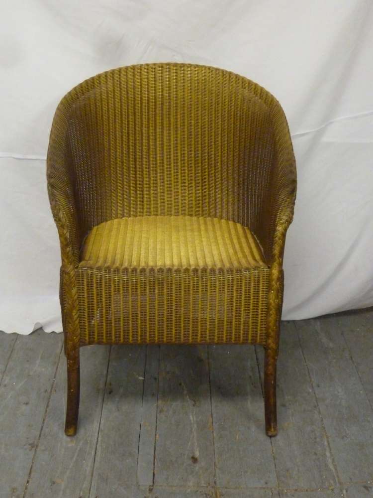 Lloyd Loom chair with original label to base