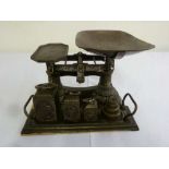 Cast iron balance scale and seven weights