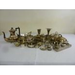 A quantity of silver plate to include vases, entree dishes, and a coffee pot