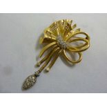 18ct yellow gold and diamond ribbon brooch with diamond drop and crescent