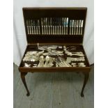 Canteen of silver plated Kings pattern flatware in a fitted table cabinet the hinged cover with