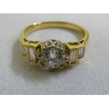 18ct yellow gold diamond ring, the centre stone approx .65 pts with two baguettes on each shoulder