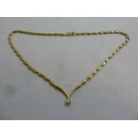 18ct yellow gold bead necklace with a solitaire diamond integral pendant