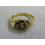 18ct gold diamond three stone crossover ring