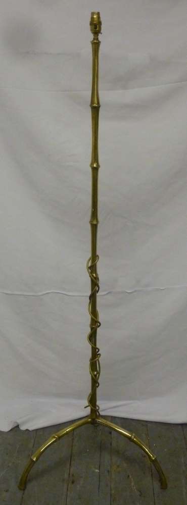 Brass lamp stand on three outswept legs of simulated bamboo form