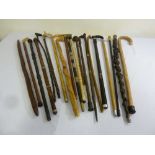A quantity of walking sticks and canes (20)