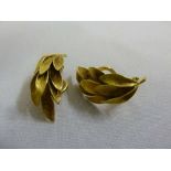 A pair of 18ct gold leaf earrings