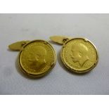 A pair of cufflinks set with George V sovereigns