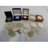 A quantity of Russian silver coins and medallions