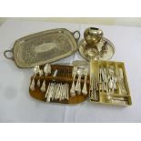 A quantity of silver plate to include a tea tray and flatware