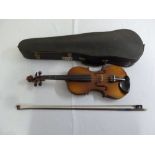 A German students violin with bow in fitted case - bearing label to the inside
