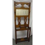 Oak arts and crafts hall stand, rectangular, pierced slats to the back, on four rectangular legs