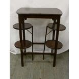 Mahogany tea table with hinged double plate stands