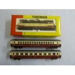 Fleischmann HO gauge diesel loco 4232 in original packaging and two coaches