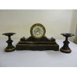 Black marble mantle clock, circular enamel dial with Roman numerals and two train movement flanked