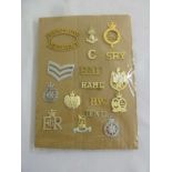 A quantity of military badges