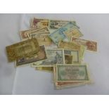 A quantity of banknotes to include Japan, Italy, Syria, Germany, Belgium, Palestine, Dutch, and