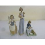 Three Nao figurines of girls