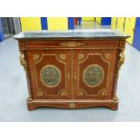 Louis XVI style shaped rectangular commode with marble top the hinged doors set with cast