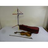 An early 20th century Violin with bow in fitted case, and music stand