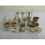 A quantity of silver and white metal to include vases, napkin rings and a mustard pot (15)