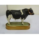 Royal Worcester Holstein Friesian bull on raised oval base (1964)