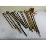 A quantity of walking sticks and canes (15)