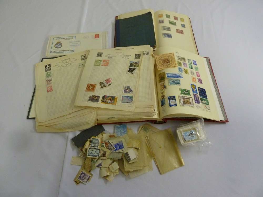 A quantity of loose world stamps and two albums