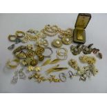 A quantity of costume jewellery to include earrings, necklaces and a Dunhill gold plated lighter