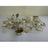 A quantity of silver plate to include an entree dish and cover, sauce boats, teapot, wine bottle