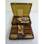 A canteen of gold plated Solingen flatware, 12 place setting to include certificate in a briefcase