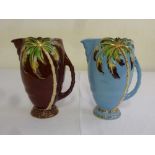 Two Beswick porcelain palm tree jugs, burgundy and blue