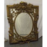 An ornate gilt wall mirror in 19th century style - A/F