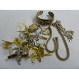 A quantity of silver and costume jewellery to include a silver bangle, necklaces and cufflinks