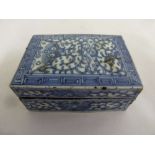 Chinese blue and white rectangular seal box, decorated with stylised leaves and scrolls with pull