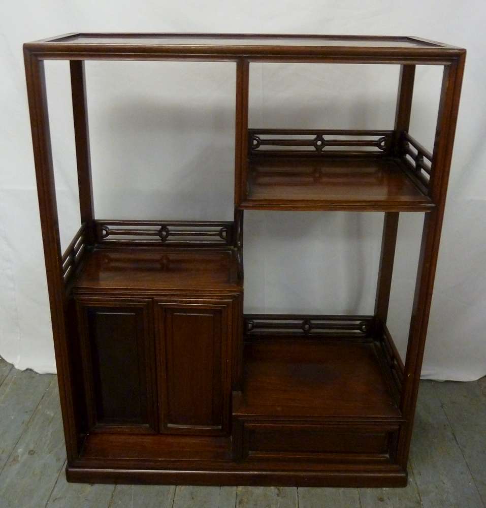 Chinese mahogany display stand, rectangular with one draw and a cupboard with two doors