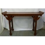 Chinese mahogany hall table, rectangular on four ornately carved legs